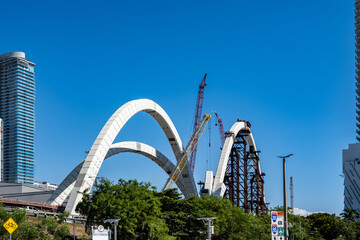 Suspension bridge arches under construction in miami 