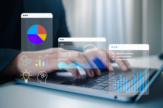 Professional hands typing on a laptop with holographic data charts and icons. This image represents innovation, strategic planning, business intelligence, and digital idea generation.