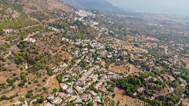 Aerial landscape view of Sierra de Mijas
Mountains. Mijas is a municipality in the Province of Málaga, in the autonomous community of Andalusia, Spain. Ambient Drone Landscape Exploration.