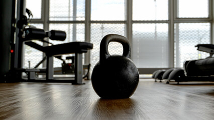 Kettlebell or barbell in the gym