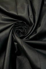 Obraz premium Dark Charcoal Grey Swirling Fabric Texture