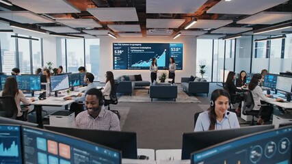 Modern Office Environment with Diverse Team Collaborating on Financial Data Analysis. - Powered by Adobe