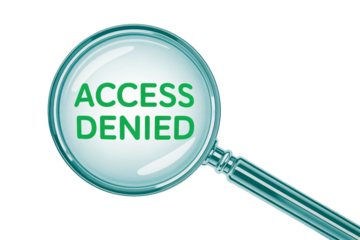 Magnifying glass reveals critical 'Access Denied' message, highlighting security and restriction concepts for digital or physical barriers.