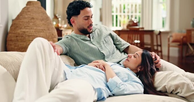 Sofa, couple and relax with love for bonding, chat together and healthy relationship in living room. Happy people, man and woman or partner for connection, smile or commitment with marriage in home