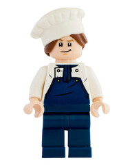 Naklejka premium Dortmund - Deutschland 13. November 2025 - Lego Figur Koch in Latzhose - Studio Aufnahme