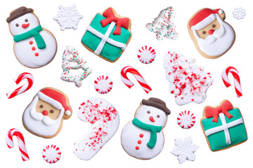 Obraz premium Assortment of colorful Christmas cookies and sweets. Above view. Unique items isolated on a transparent background. Holiday baking concept.