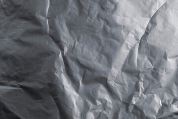 Crumpled Silver Foil Surface With Wrinkled Texture For Studio Backgrounds, Packaging, And Design Projects