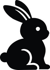 Sitting black rabbit icon silhouette with eye and ear details