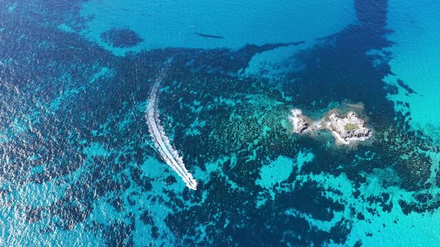 Aerial view of Crystal Clear Turquoise Water and Wild Beaches of ibiza