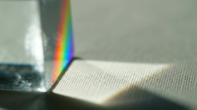 Close up of an open book and paper notebook with a pen next to a computer keyboard on a table, symbolizing business, office, and education learning