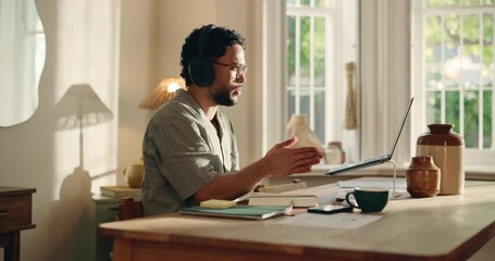 Creative, man and video call on laptop at house for discussion, question source and feedback. Male person, remote work and headphones for webinar, writing notes and information on article publication