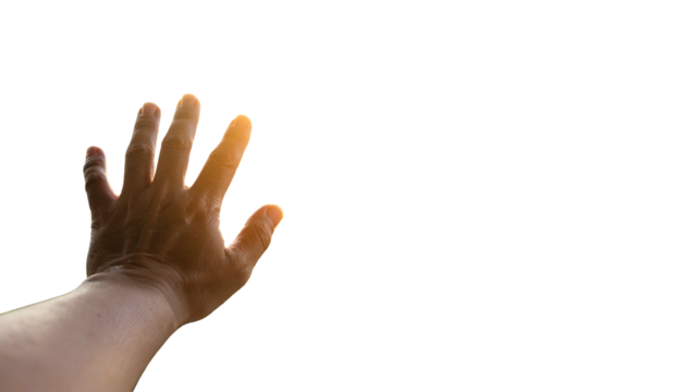 A human hand outstretched against a black backdrop, with bright light outlining fingers