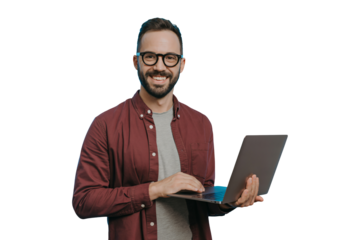 Smiling man with glasses works on laptop with confidence, portraying modern entrepreneurship and digital lifestyle, perfect for tech and business projects