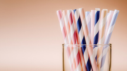 Colorful cocktail straws in a glass celebrating Cocktail Straw Day for a fun and festive drink experience on a sunny afternoon