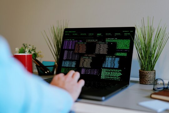 Middle Aged Male Red Team Cybersecurity Researcher Conducting Offsite Remote Corporate Penetration Test of Network Security - White Hat Hacker Concept