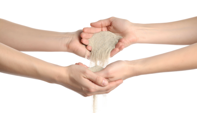 Two sets of hands, one pouring sand into the other. Symbol of time