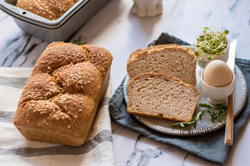 Wholemeal bread with sesame seeds, on the Easter table