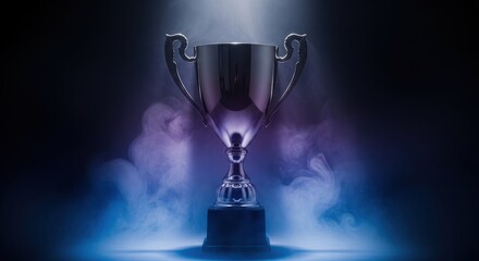 Silver trophy illuminated by dramatic blue and purple light and smoke.