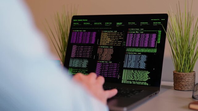 Middle Aged Male Red Team Cybersecurity Researcher Conducting Offsite Remote Corporate Penetration Test of Network Security - White Hat Hacker Concept