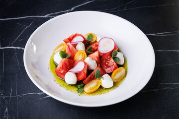 Colorful Tomato Burrata Salad With Radish, Olives, And Fresh Herbs