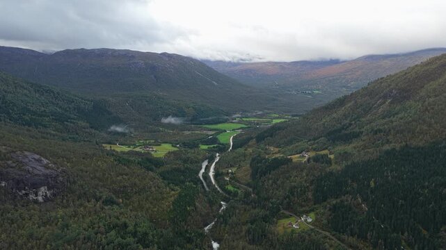 Aerial view of steep Stalheim pass above lush green valley, Norway