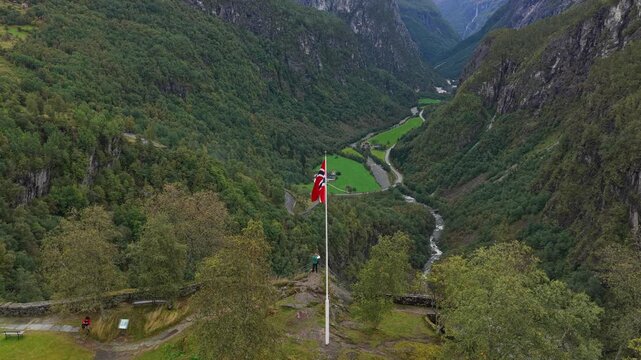 Aerial view of Stalheim pass, Stalheim Hotel and waving Norway flag