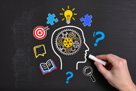 Knowledge, inspiration, Drawing lightbulb and head silhouette on chalkboard