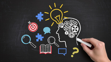 Knowledge, inspiration, Drawing lightbulb and head silhouette on chalkboard