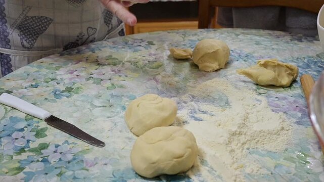 Kneaded flour cut on a tablecloths
