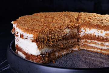 a chocolate cake seen from a side view isolated
