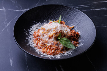 Pasta con Salsa di Pomodori - Pasta with Tomato Sauce: Classic pasta in a rich tomato sauce, seasoned with basil and garlic