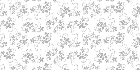 Subtle light grey seamless floral pattern, delicate blossoms and elegant swirling tendrils create a sophisticated decorative background texture