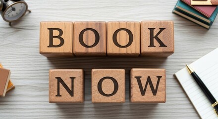 Time to Read: Book Now is spelled out with wooden blocks atop a wooden surface, with clock and accessories. This image shows a call to action.