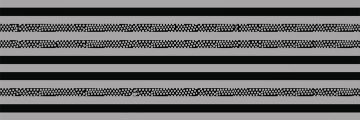 A horizontal view of alternating black and gray stripes with dotted patterns in a repeating sequence design