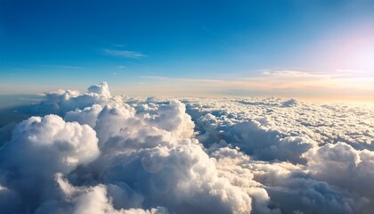 vast expanse of fluffy white clouds viewed from above sunlight illuminating the scene atmosphere fluffy