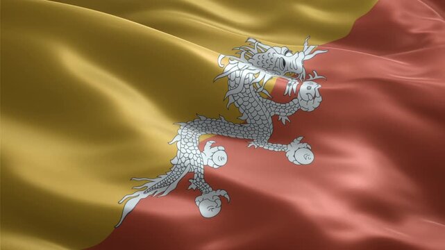 Waving flag of Bhutan with a white dragon in the center.