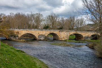 Fototapeta premium Puente Mayor, a medieval stone bridge in Aguilar de Campoo, Palencia