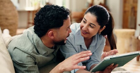 Tablet, relax and couple in home with talking for planning romantic holiday together. Happy, digital technology and man with woman for booking flights on app for vacation in living room at house - Powered by Adobe