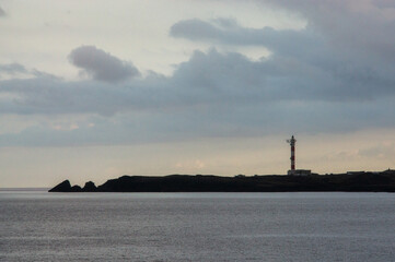 Fototapeta premium The Spanish Atlantic coast with a view of the lighthouse in the evening