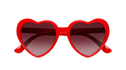 Red heart shape sunglasses with dark lenses for fashion accessory or Valentines Day gift on transparent background.