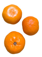 Three ripe oranges on a black background. The oranges are bright orange in color, round, and have a smooth texture. They appear fresh and juicy.