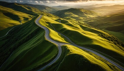 Serpentine Road Winding Through Lush Green Rolling Hills at Golden Hour
