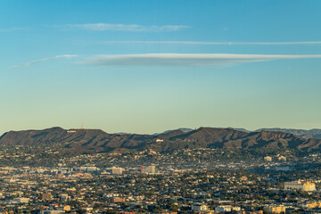In the distance is Hollywoodland Sign and Griffith Observatory in the Santa Monica Mountains.  from InterContinental Los Angeles Downtown by IHG, California