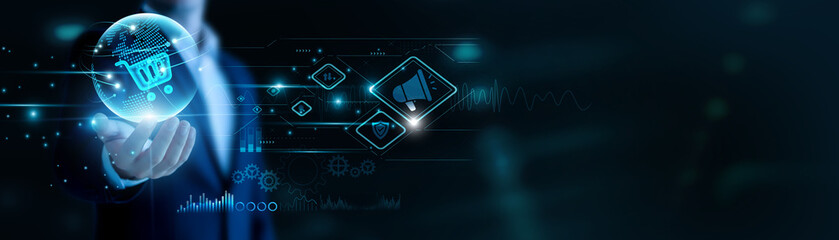 Businessman hand hold E-Commerce and global networking, driving online sales. Digital storefronts expand reach, automated systems support customer transactions.