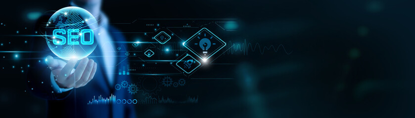 Businessman hand hold SEO and global networking, enhancing digital visibility. Targeted keywords...