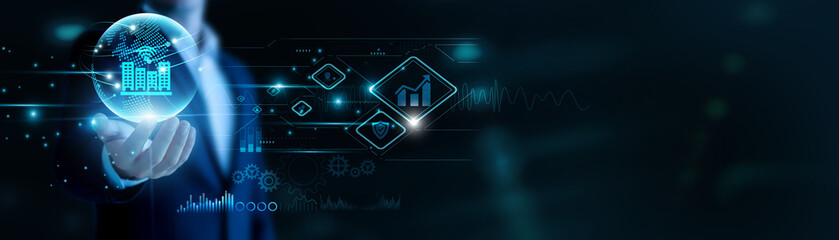 Businessman hand hold Smart Building and global networking, integrating IoT systems. Automated controls save energy, intelligent environments enhance modern living.