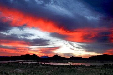 Sunset scene across Perris Lake, Moreno Valley, California, USA