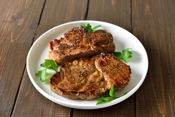 Juicy grilled pork steaks