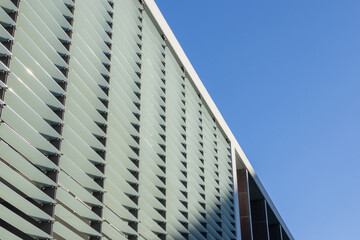 Modern building facade with glass louvers sunshade system