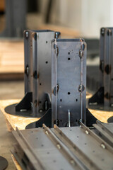 Welded metal structures and supports for a wooden house